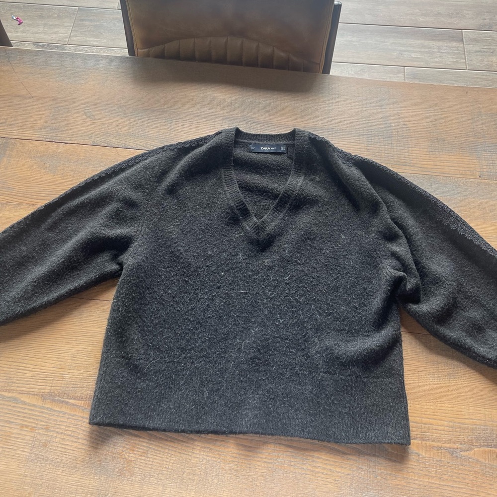 Zara v neck sweater with lace design on the sleeve